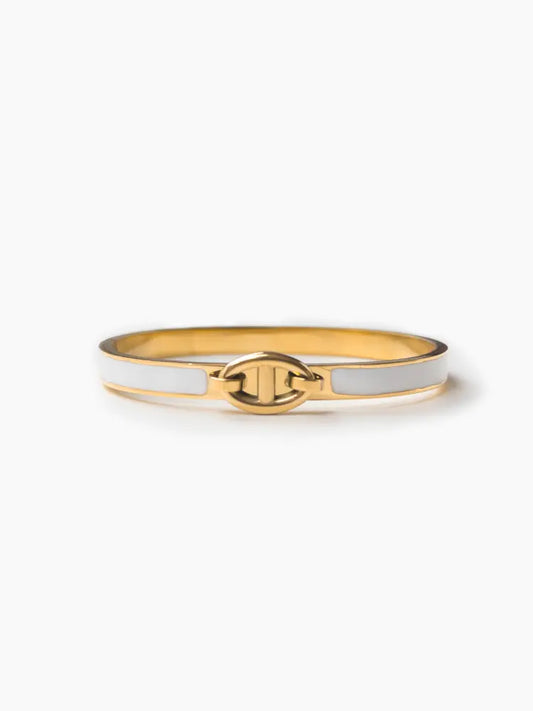 Gold bangle with white enamel detailing and T-style clasp, Elara Bangle by Sparkle Studio.